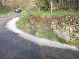 Travaux d’aménagement sur la route communale de Péreyres : création de fossés béton avant la réfection de la chaussée 